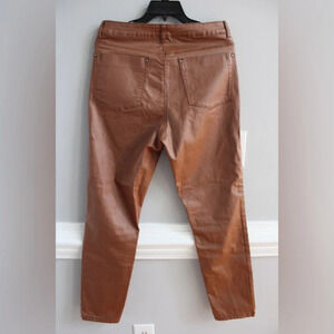 A loves a coated jeans